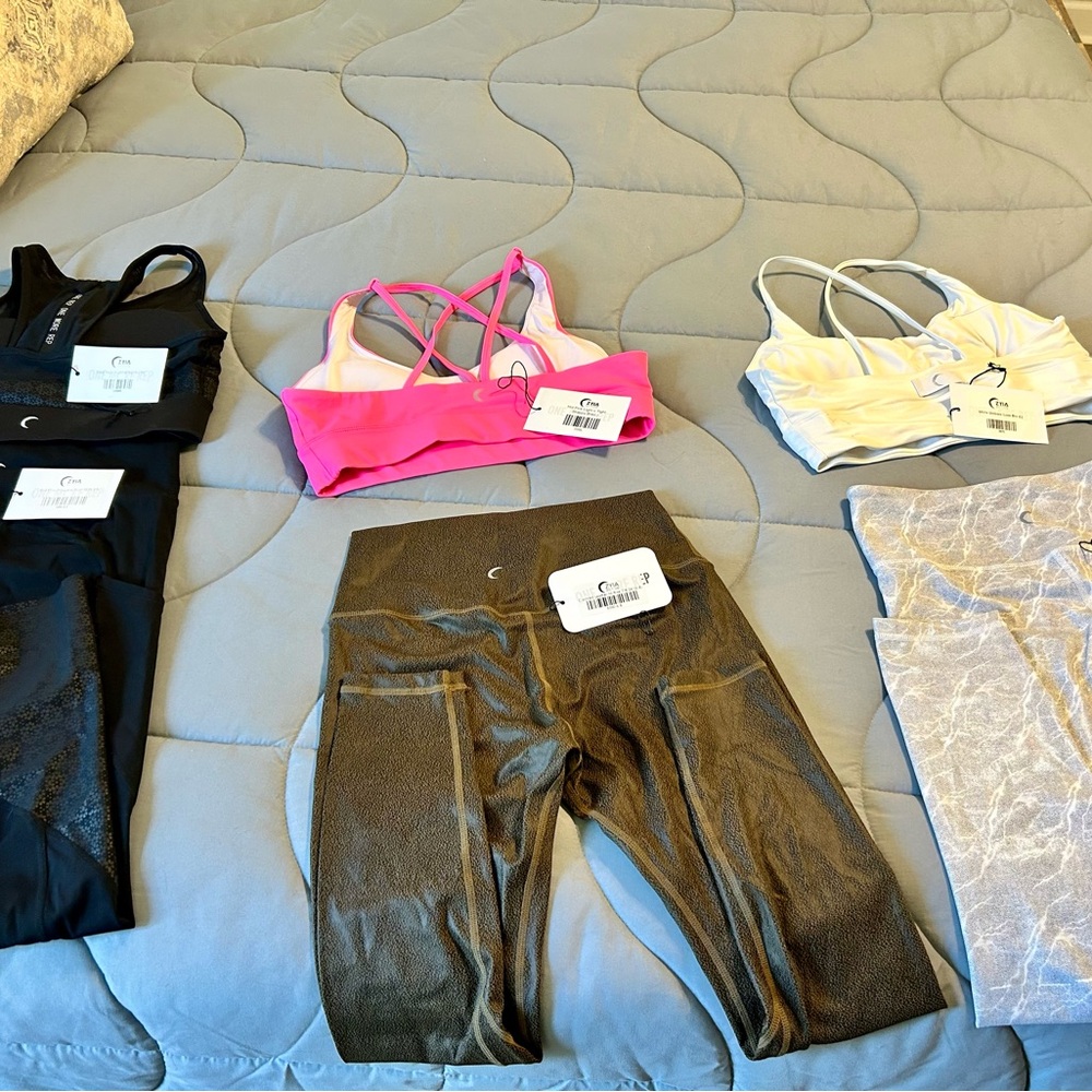 Zyia 2 pairs of leggings size 8/10 & 2 sport bras $100